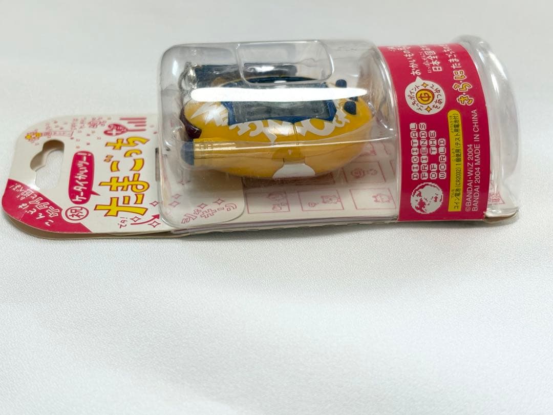 新品未開封　たまごっち　祝ケータイかいツー！　たまごっちプラス　いえろー