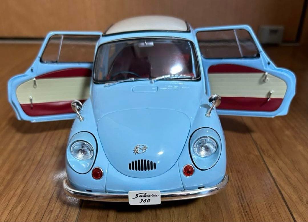 の*ー様 エブロSubaru 360 水色 ミニカー1/12