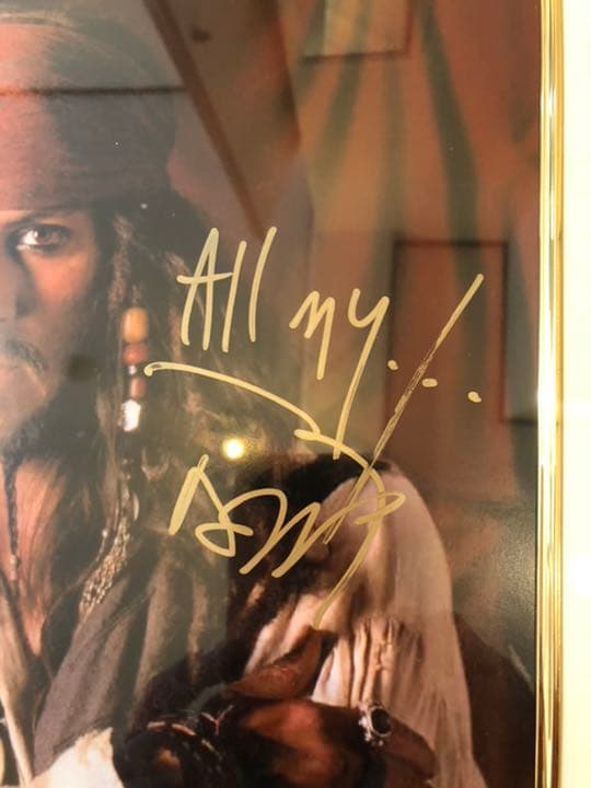 ジョニー・デップ　直筆サイン　写真〔パイレーツ・オブ・カリビアン〕