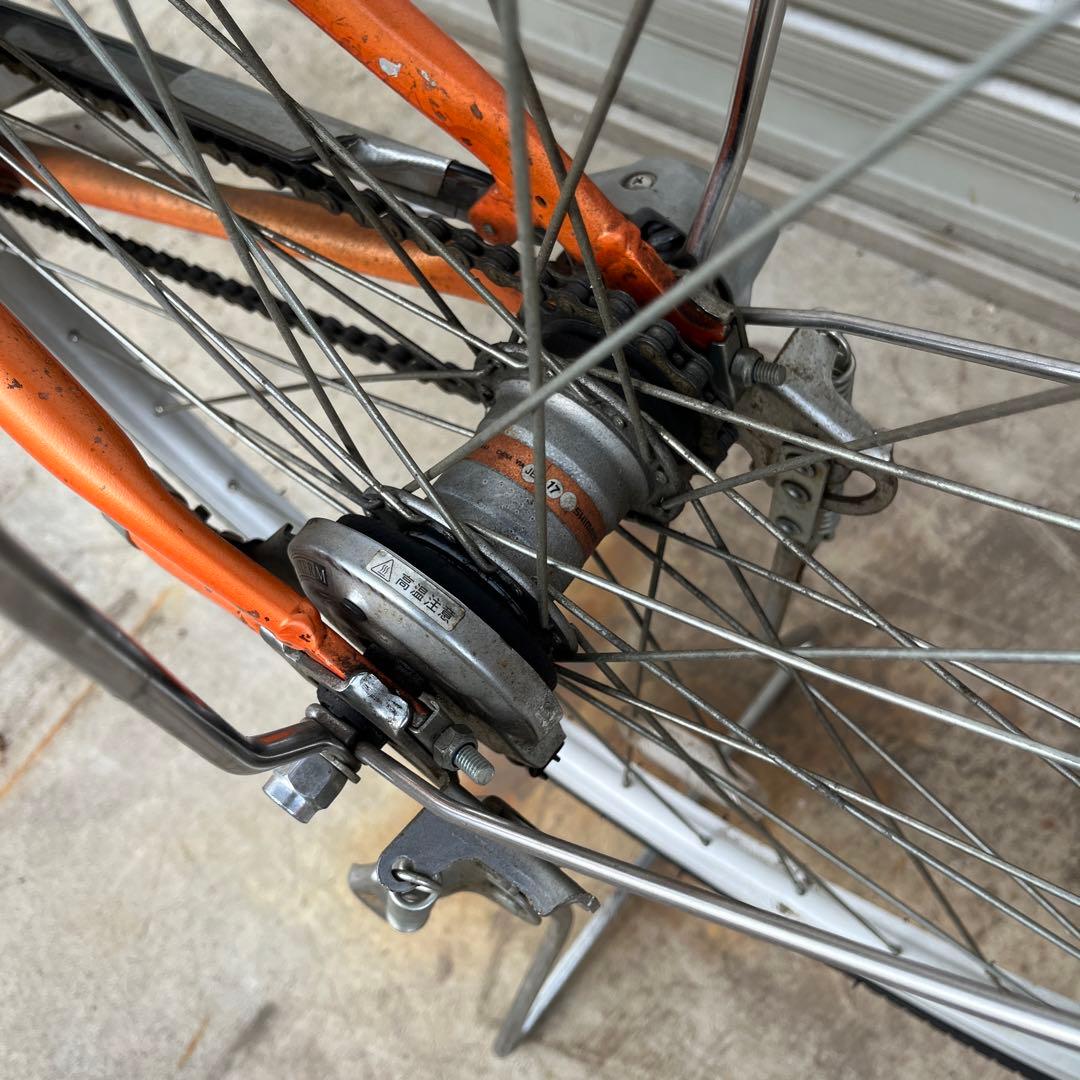 26インチオレンジ シティサイクル 前バスケット付き