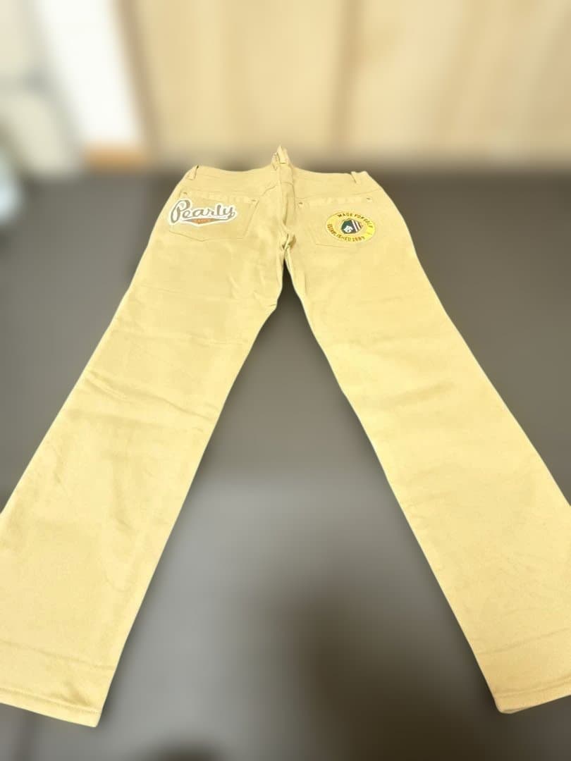 ベージュ パンツ