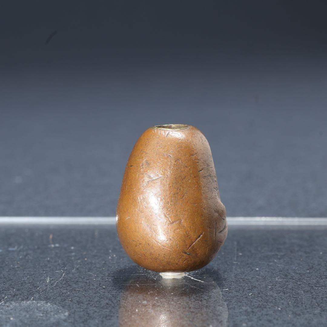 緒締め玉　達磨　提げもの　金属　茶色　金工　R1641