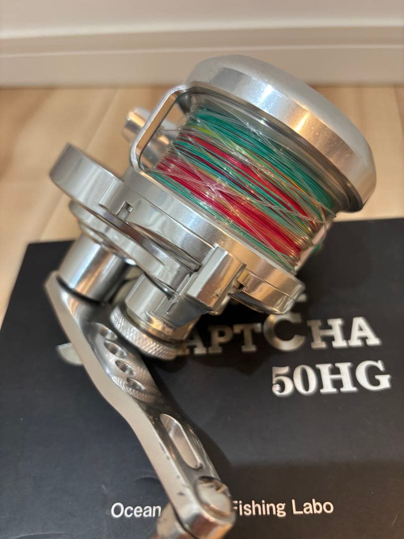 Ocean Freaks CAPTCHA 50HG 左巻き　ライン付き