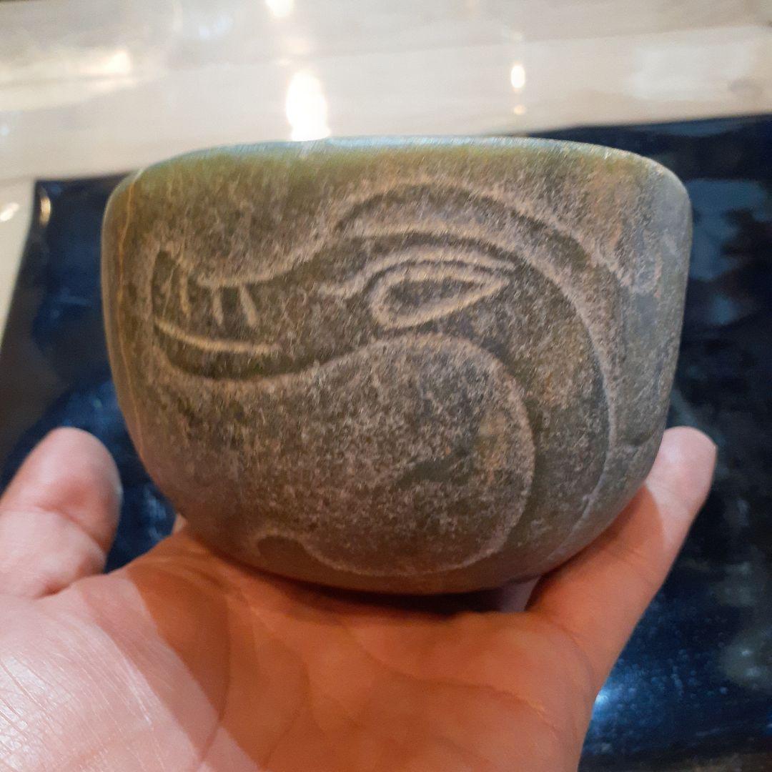 硬玉人面器