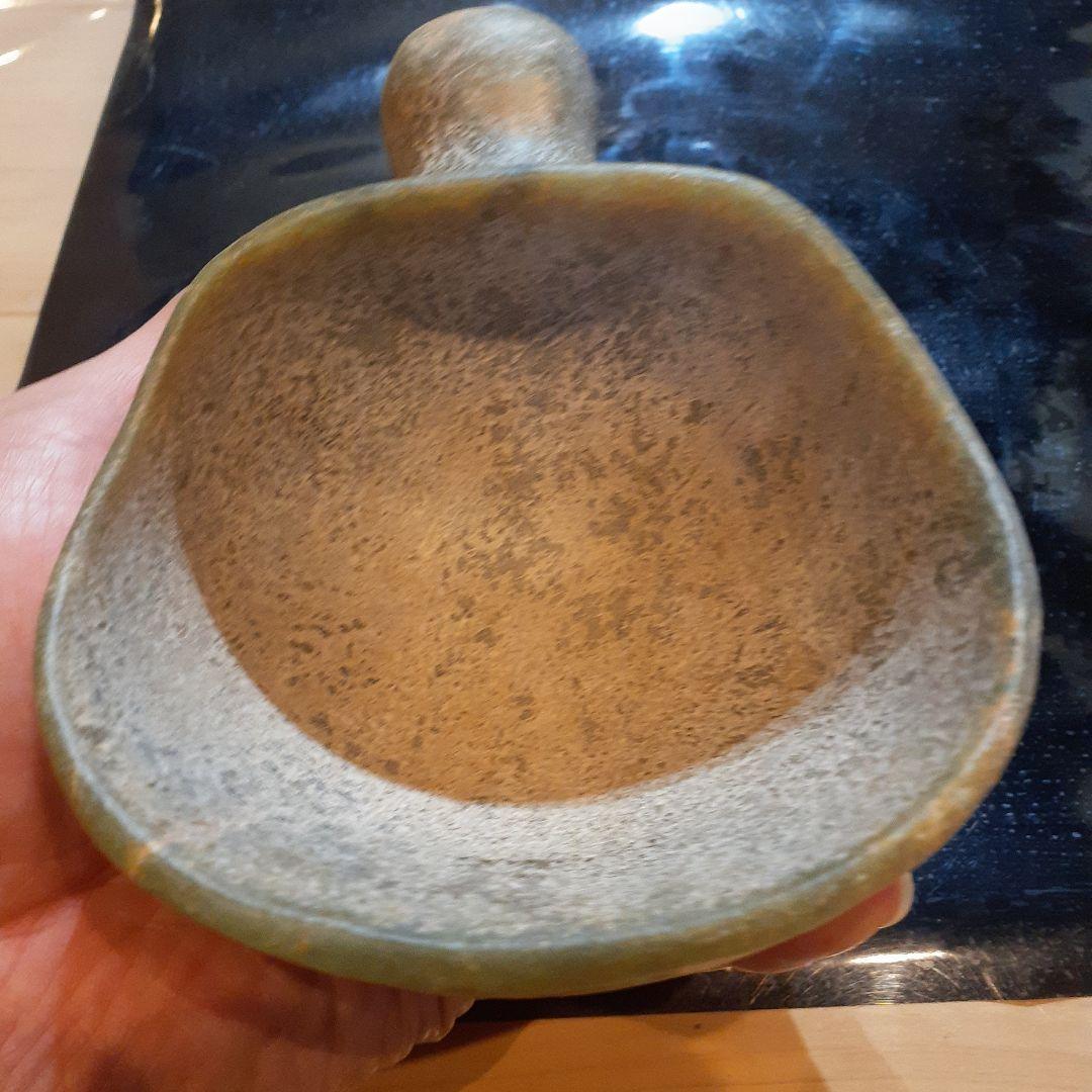 硬玉人面器