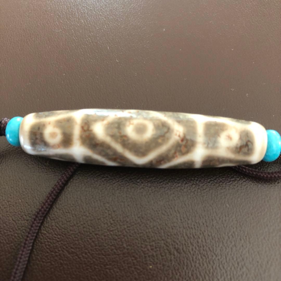 老礦九眼天珠