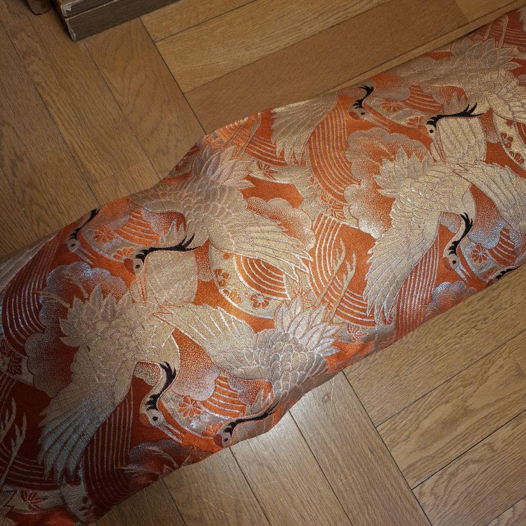 オレンジ色の鶴模様の袋つき　　　お琴