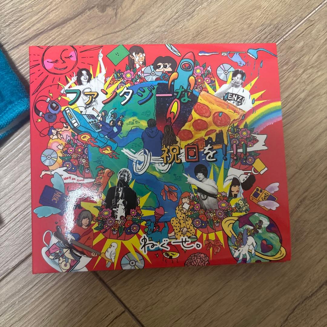 サイン入りCDとバンド付きタオルセット