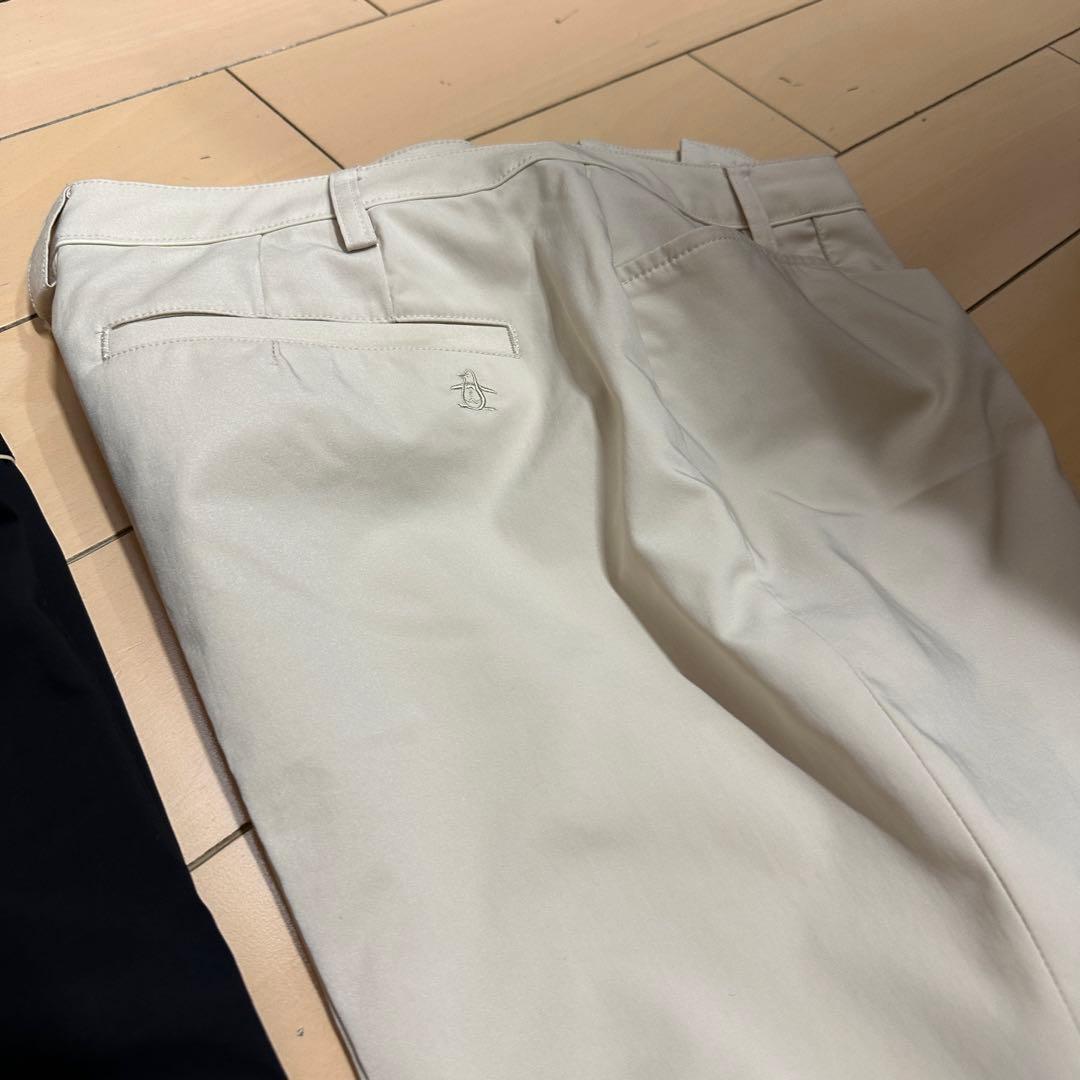 マンシングウェア レディースゴルフパンツ ブラック＆オフホワイト 2点セット
