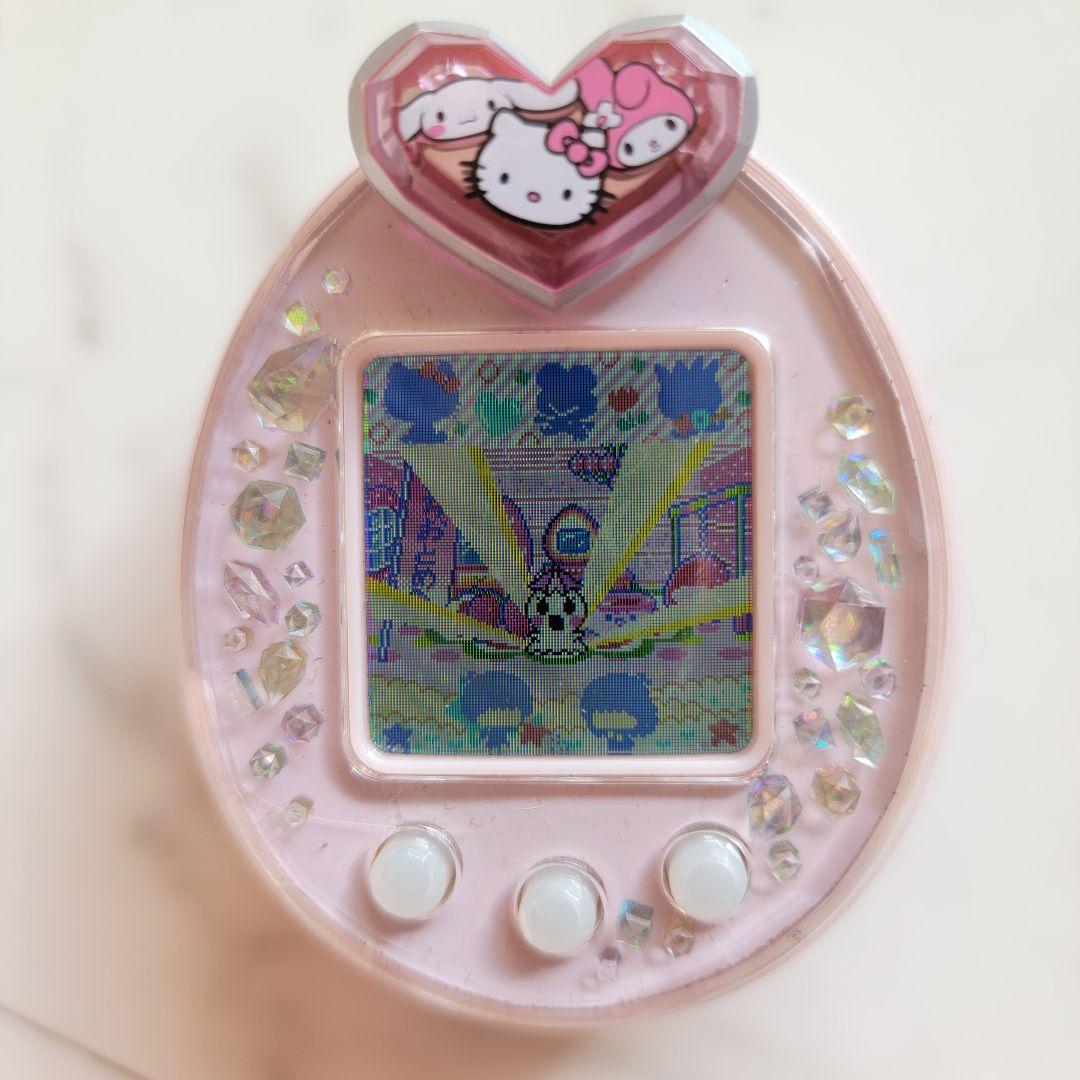 たまごっちピース本体+たまデコピアス（サンリオ）/ピンク/箱・説明書付き