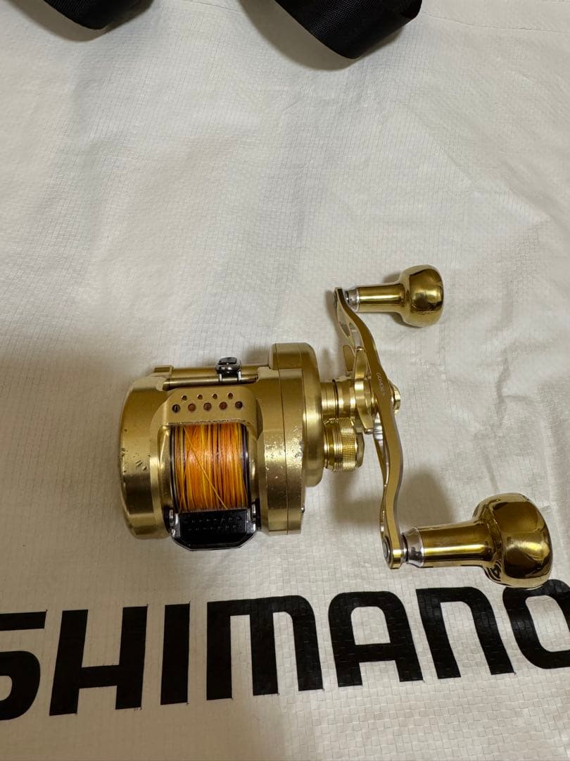 シマノ 15カルカッタコンクエスト300 社外ハンドル（純正有り）