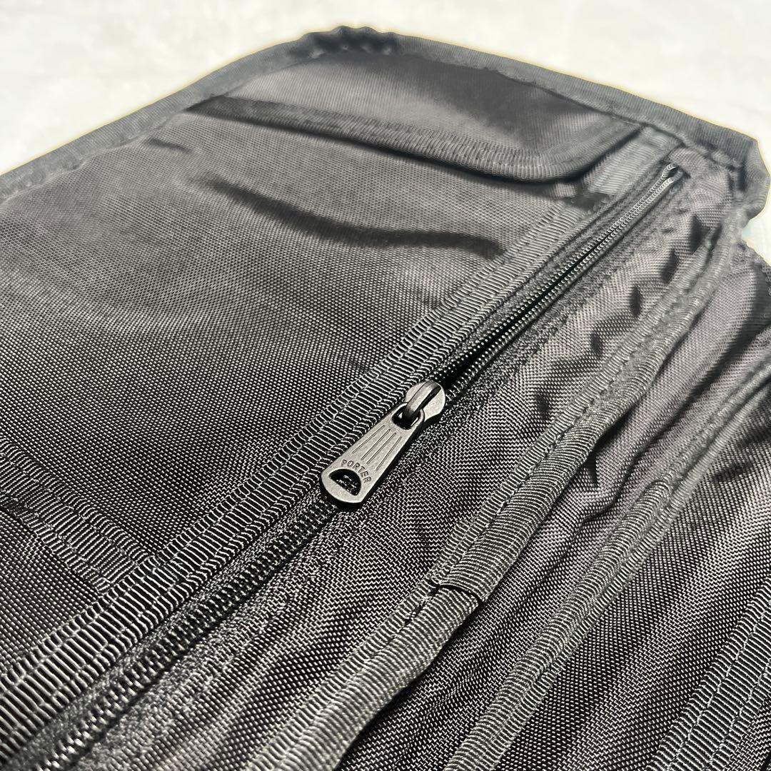 original fake PORTER パスポートケース 黒 青 KAWS