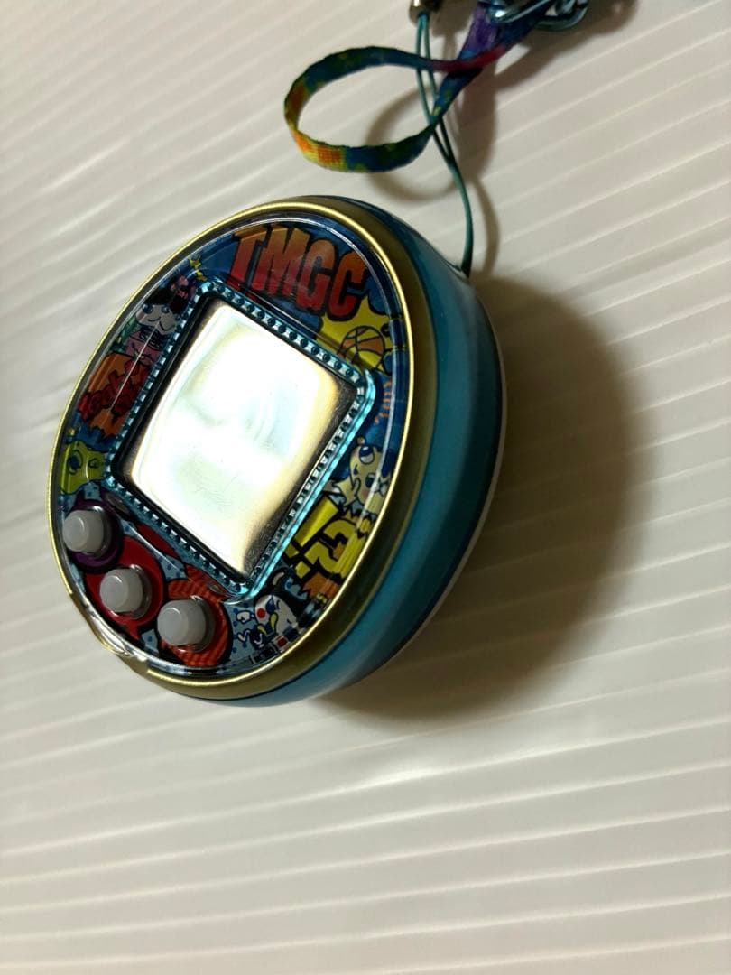 動作確認済　たまごっち4U ブルー　アメコミ　カバー
