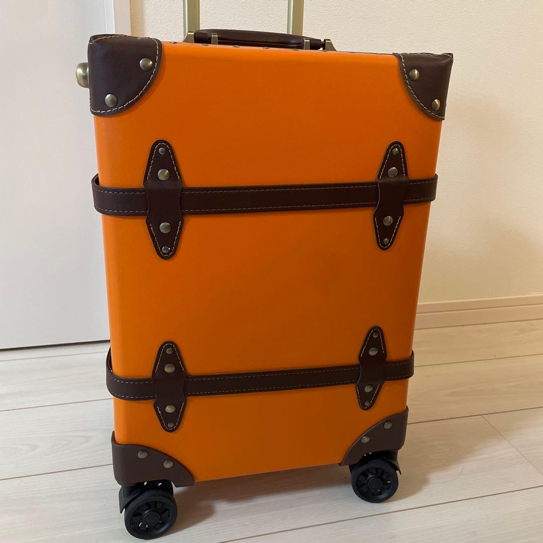 キャリーケース　トランク　スーツケース　オレンジ　旅行　おしゃれ　可愛い　高級