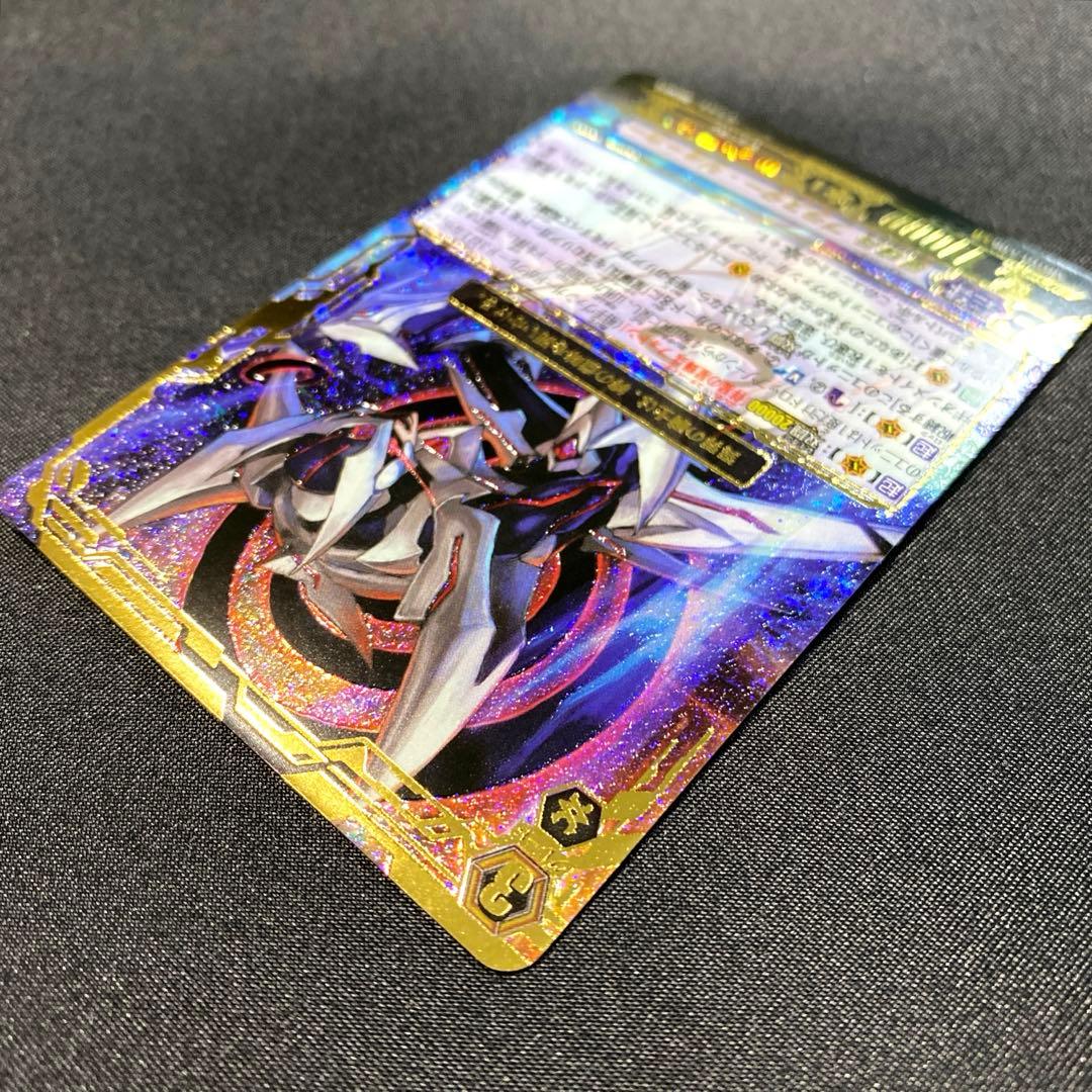 マ