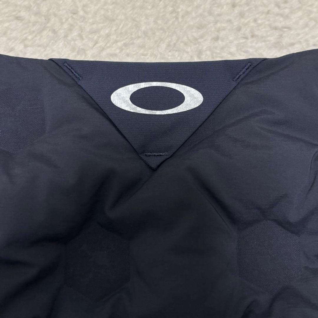 未使用品 オークリー ゴルフ 軽量 ストレッチ ダウンジャケット L