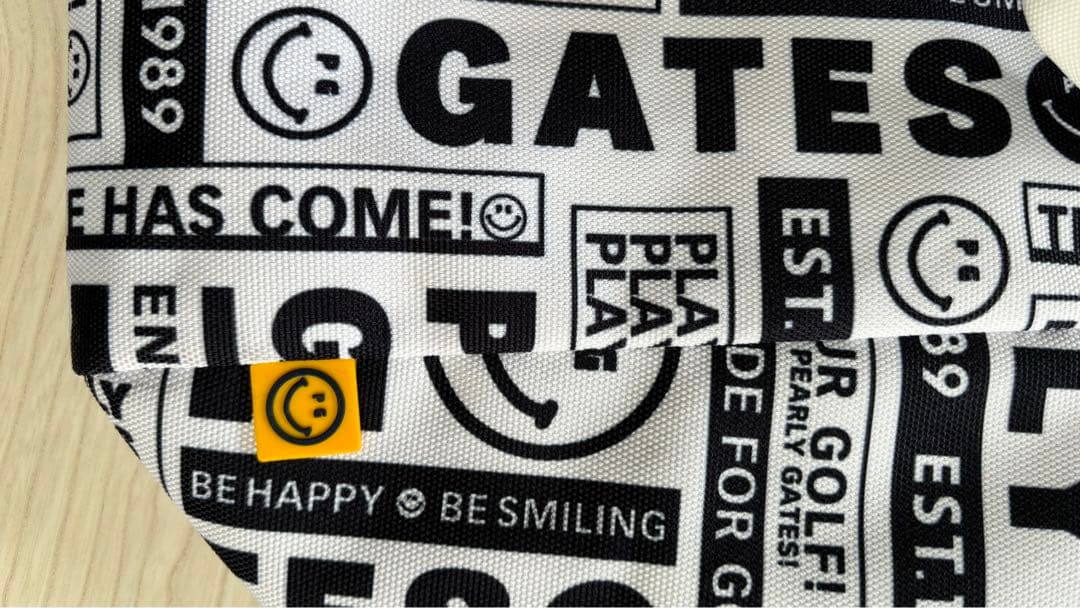 パーリーゲイツ　ロッカーバック　ニュースペーパー柄