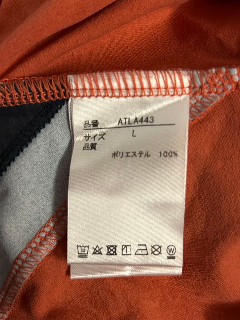 アドミラル　テニスウェア　オレンジ色トップス　Lサイズ