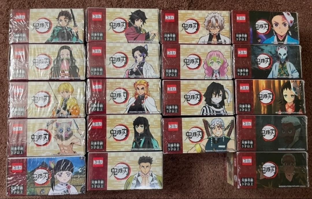 鬼滅の刃 vol.1〜vol.4・ドリームトミカ，ガムトラック。クリアケース付き