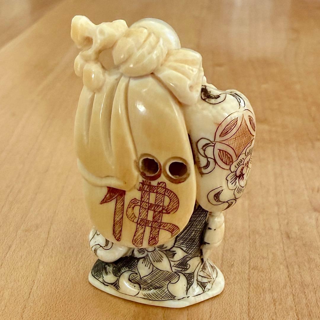 根付　布袋様
